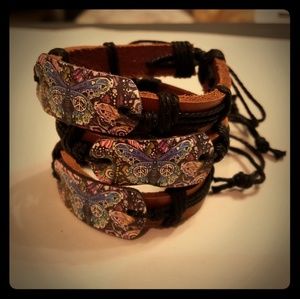 Butterflies and peace sign leather bracelets